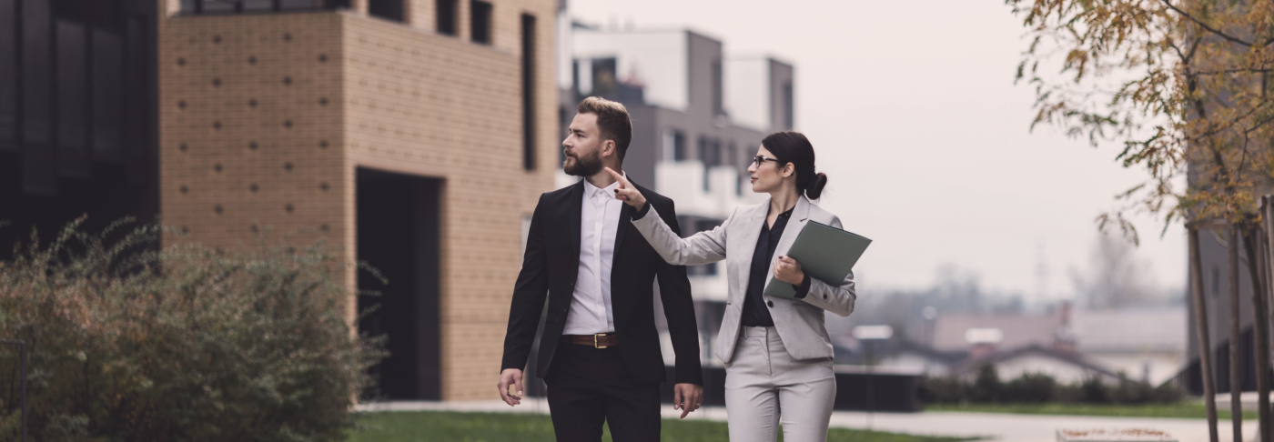 Estate planning professionals discussing property and asset management